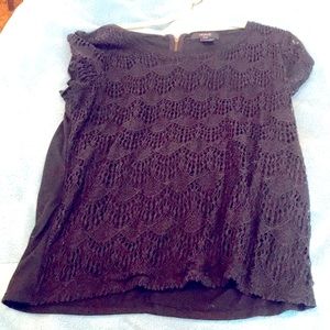 Lace crochet front jersey back shirt sleeve top. Lined